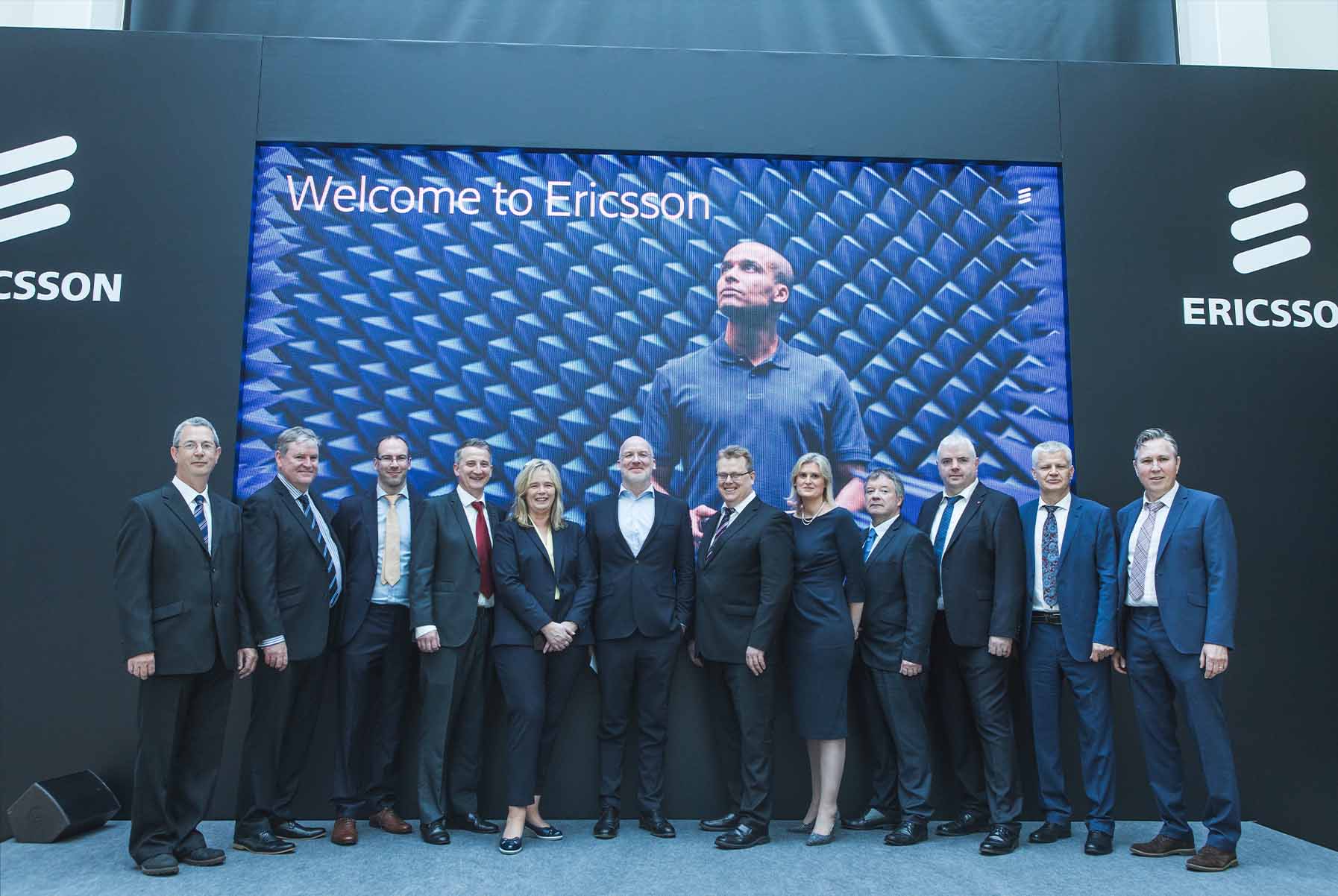 Corporate photographer Dublin capturing a professional networking event with business professionals in suits