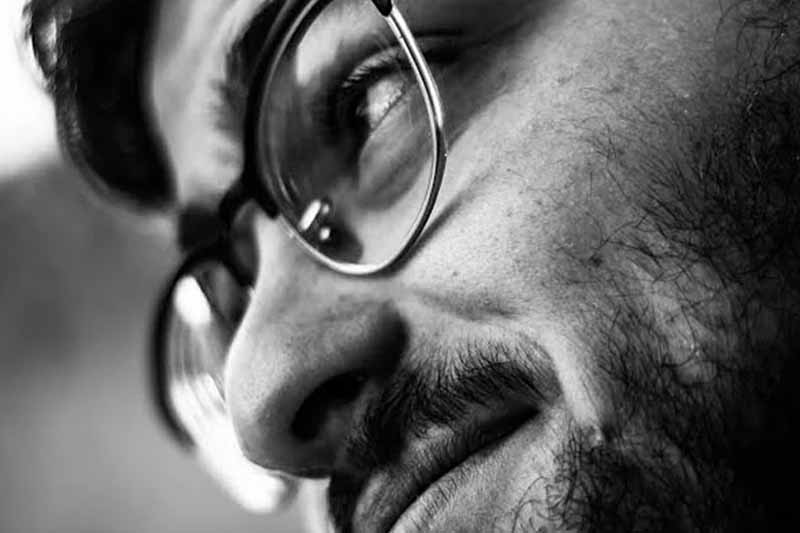 José Santos, videographer and photographer at E17, working at a business event in Dublin