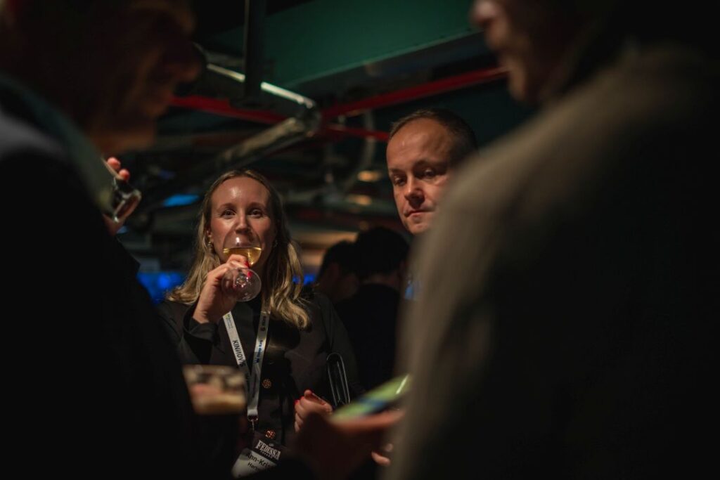 Guests Raising Glasses During Toast - E17