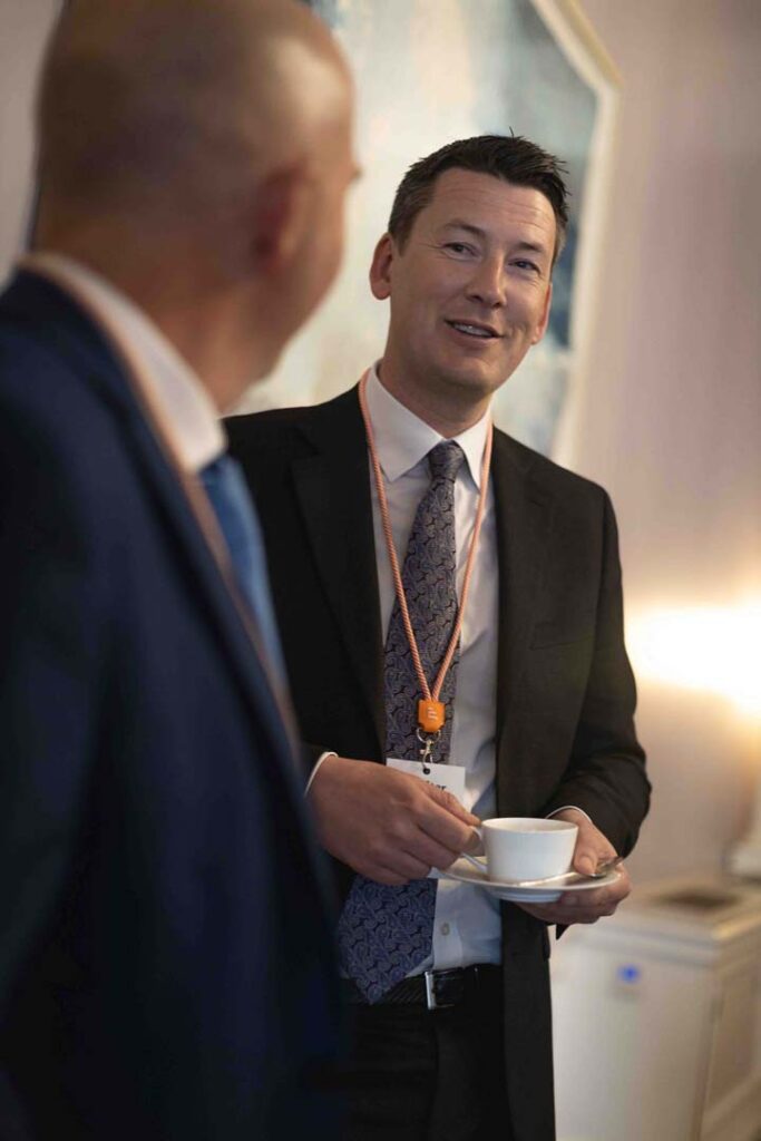 Delegates talking over coffee during a conference break at The Shelbourne