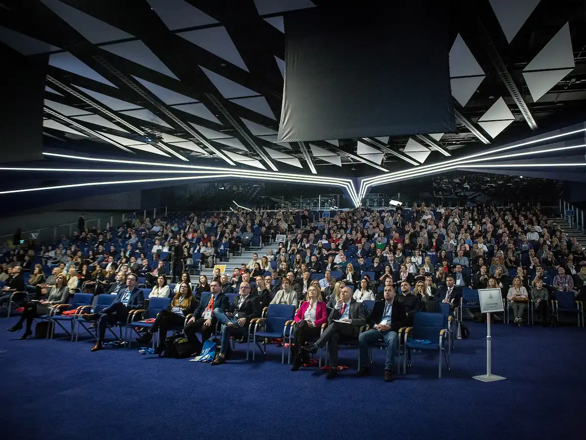 Corporate photographer in Ireland taking photo of large venu room expo