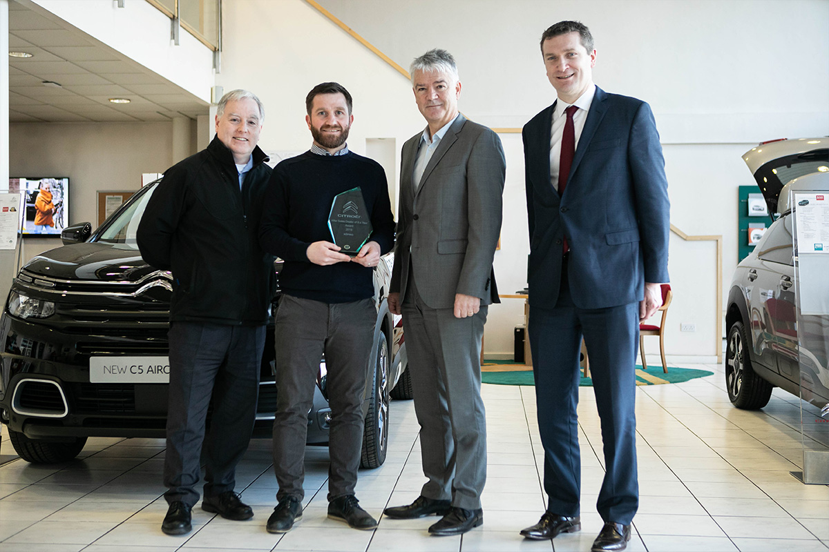 Dublin press photographer covering an award presentation