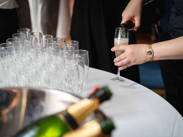 Champagne being poured for guests at a private party reception in Dublin
