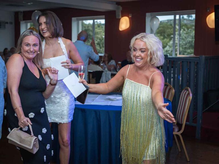 Guests greeting each other as they arrive at a birthday party in Dublin