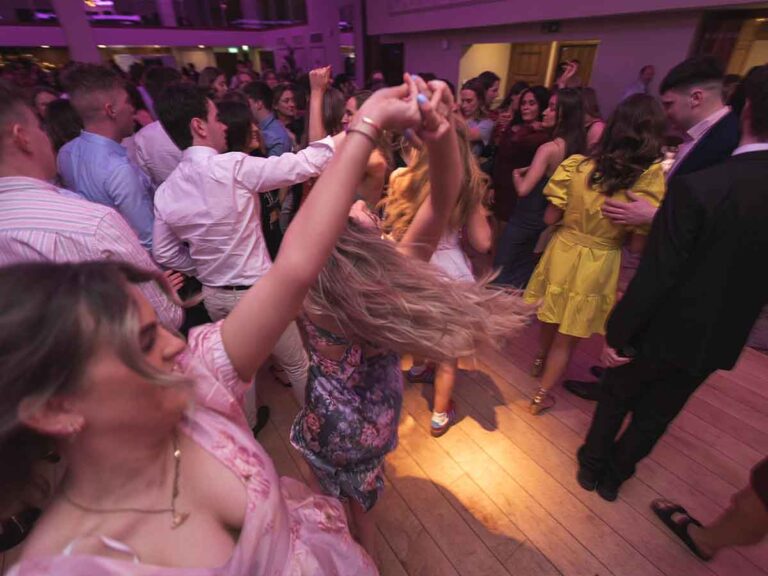 Guests dancing on a packed dance floor at a private party in Dublin